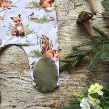 Load image into Gallery viewer, Close-up of Fox & Ferns Newborn Baby Romper foot detail, highlighting the soft fabric and detailed fox and fern print.