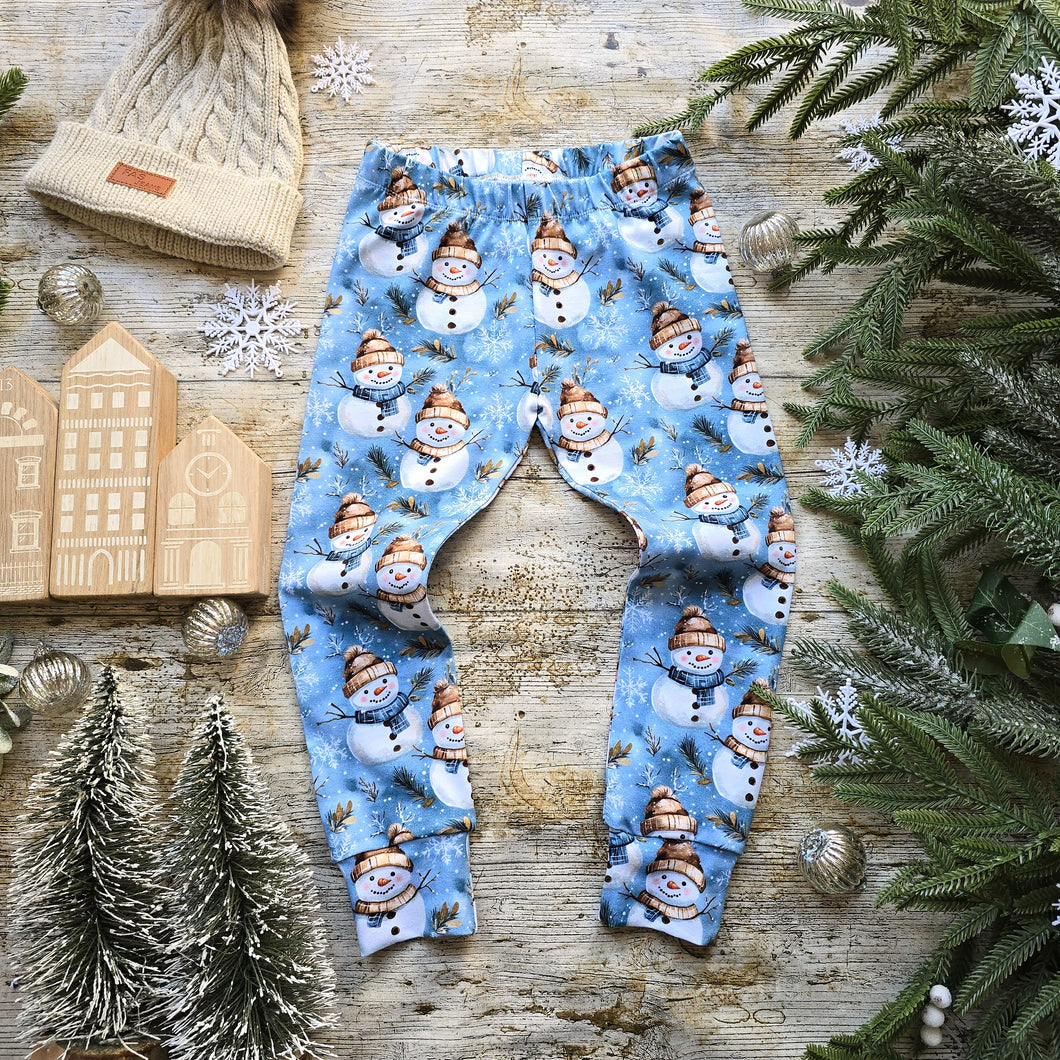 Blue Kids Winter Leggings with Snowflakes and Snowmen with Beige Beanies and Scarfs 