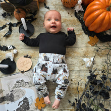 Load image into Gallery viewer, Baby wearing Haunted Mansion Harem Leggings. Pumpkins, Bats and ghosts surround them. Unisex Baby Harem Pants